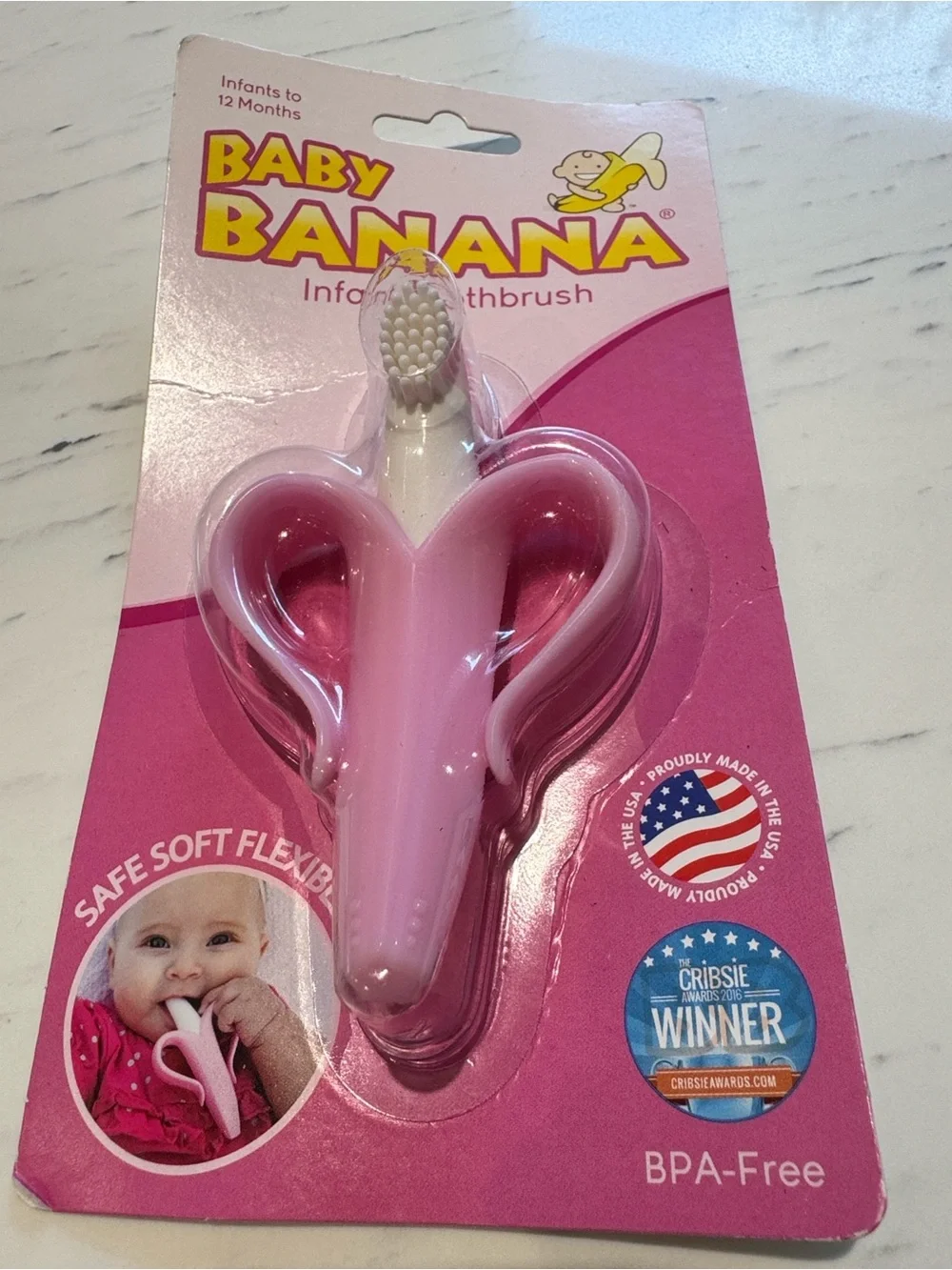 Baby Banana Infant Toothbrush & Teether - Light Pink